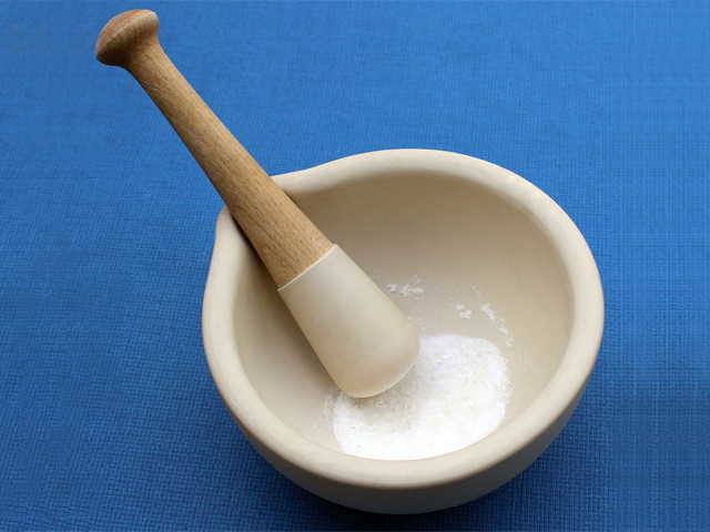 Crushed-clear-boiled-sweets-as-finely-as-possible-using-a-pestle-and-mortar